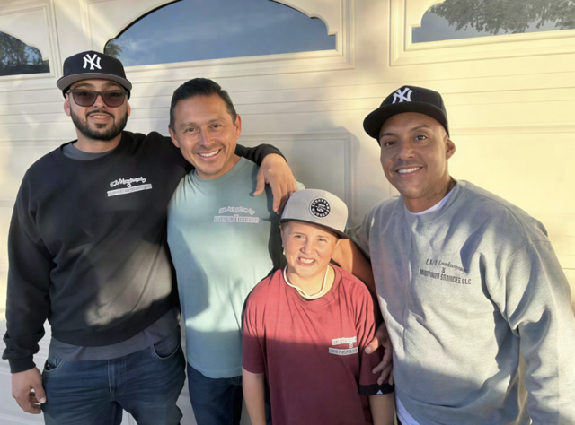 The K&O family, owners and crew, in their company shirts